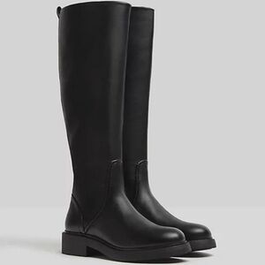 Black flat high knee boots